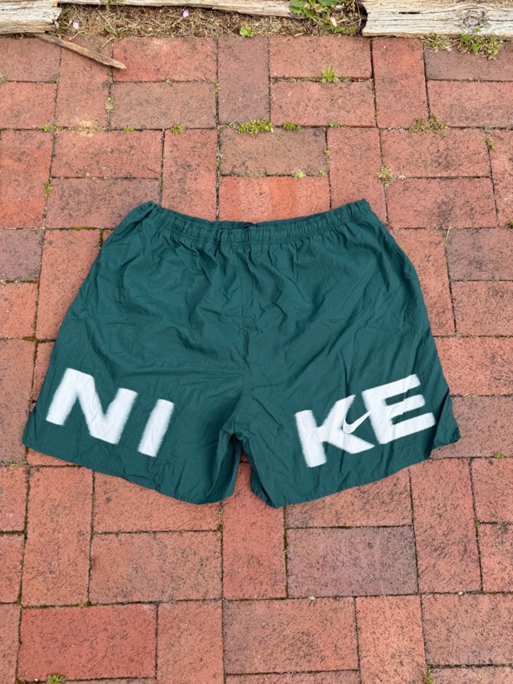 Vintage Nike Men’s Dark Green Athletic Shorts with White Logo